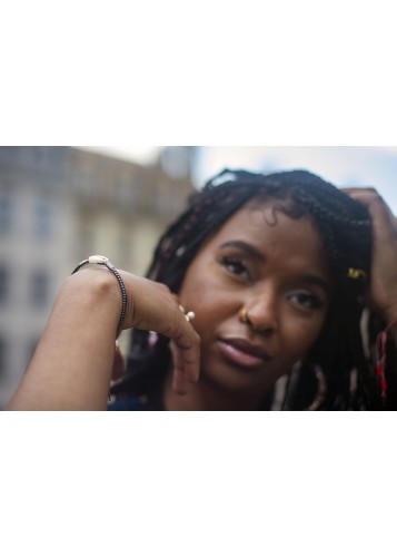 Bracelet en macramé surmonté d'un cauris