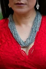 Collier de perles jaunes avec pendentif lumineux