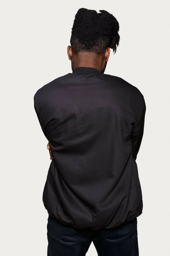 Veste bombers réversible en tissu wax vert, bleu et rouge