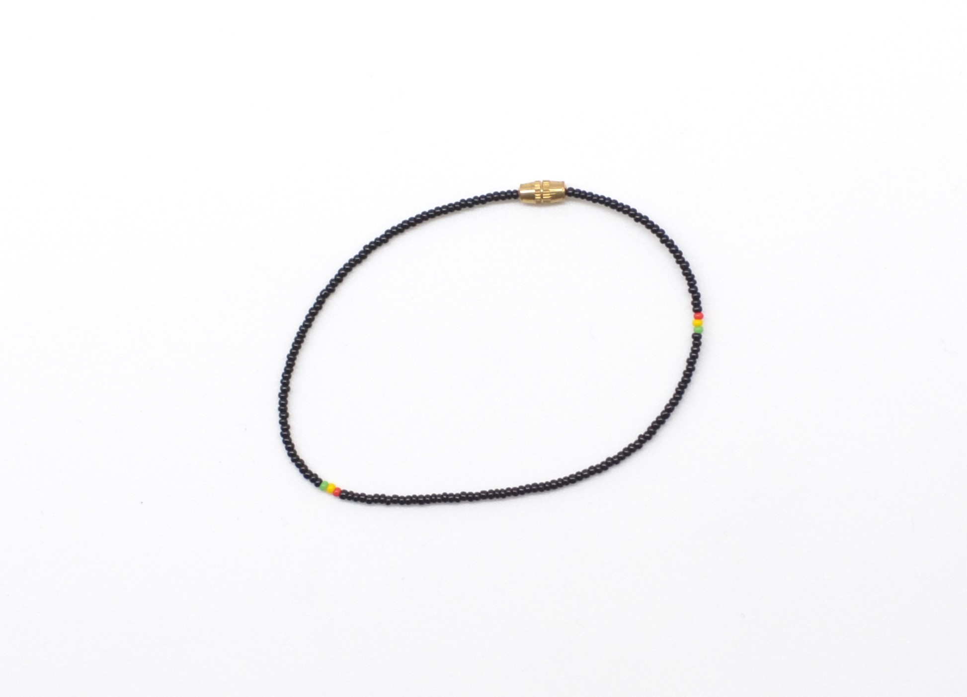 Bracelet de cheville en perles noires