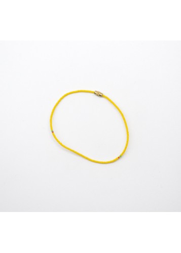 Bracelet en perles jaunes pour cheville