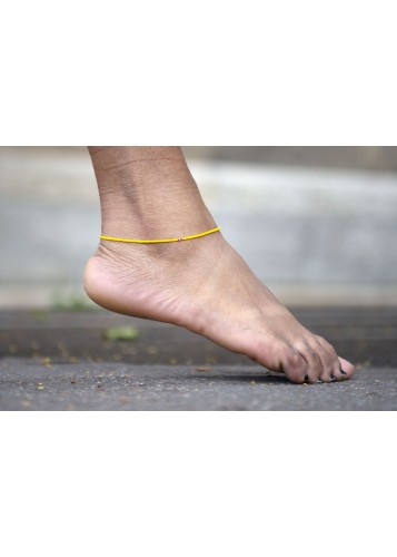 Bracelet en perles jaunes pour cheville
