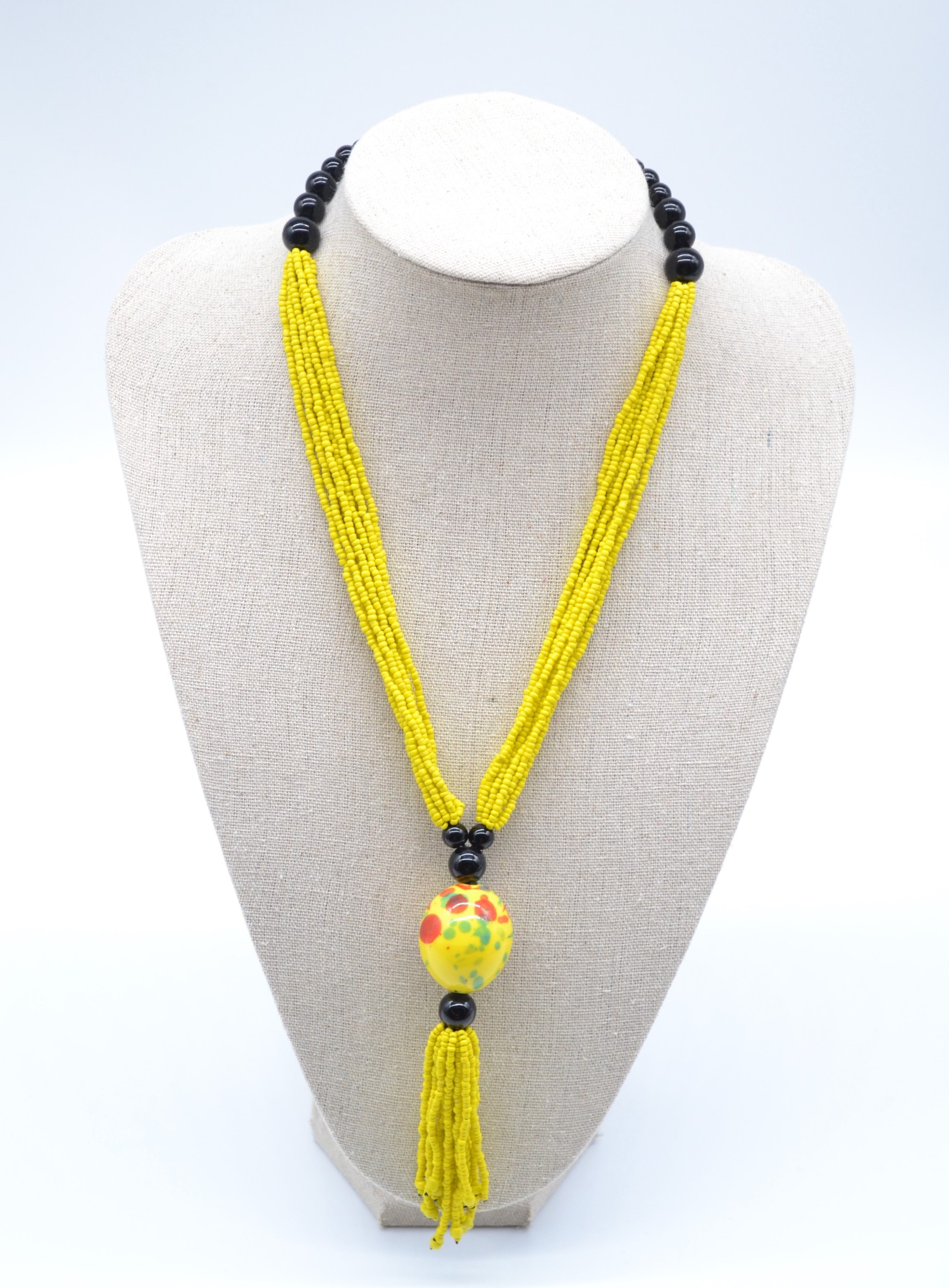 Collier de perles jaunes avec pendentif lumineux
