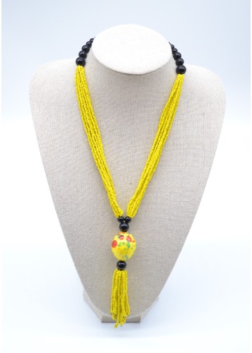 Collier de perles jaunes avec pendentif lumineux